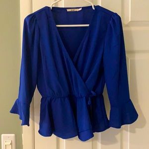 Blue peplum top with 3/4 bell sleeves